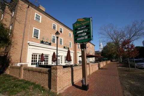 Front of Tribe Square with sign listing restaurants available