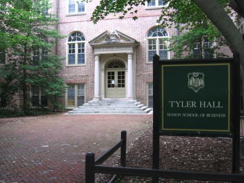 Close up of the front entrance to Tyler Hall with sign