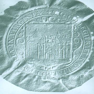 Circle engraved with Latin words and a square illustration of old campus