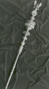 The College Mace in silver with an eagle on top